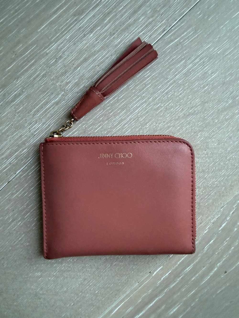 Jimmy Choo Leather Zip Wallet in Terracotta Red with Tassel